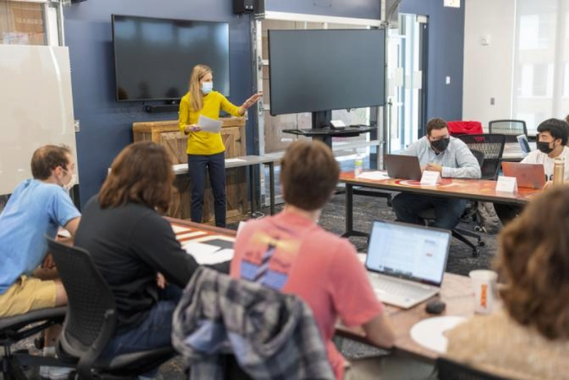 Jill speaking in front of class