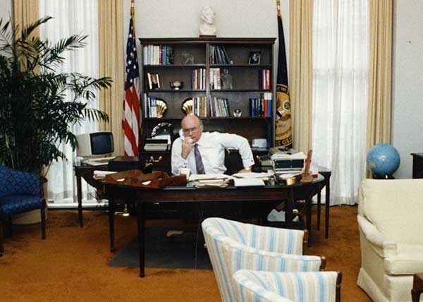 Clayton Yeutter at his desk in the United State Trade Representative Office.